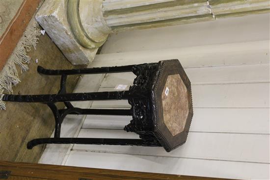 A Chinese rosewood octagonal jardiniere stand, W.1ft 2.5in. H.2ft 8in.